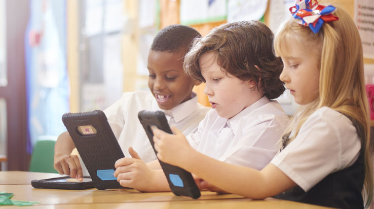 How can a whole-society approach to cyber security help schools